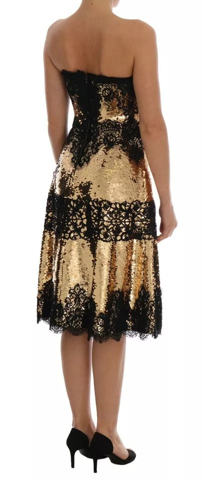 A gold strapless sequin embellished lace dress with a fitted bodice and flared skirt