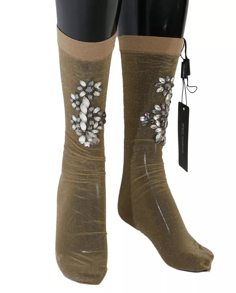 Pair of boots with glittery embellishments on legs
