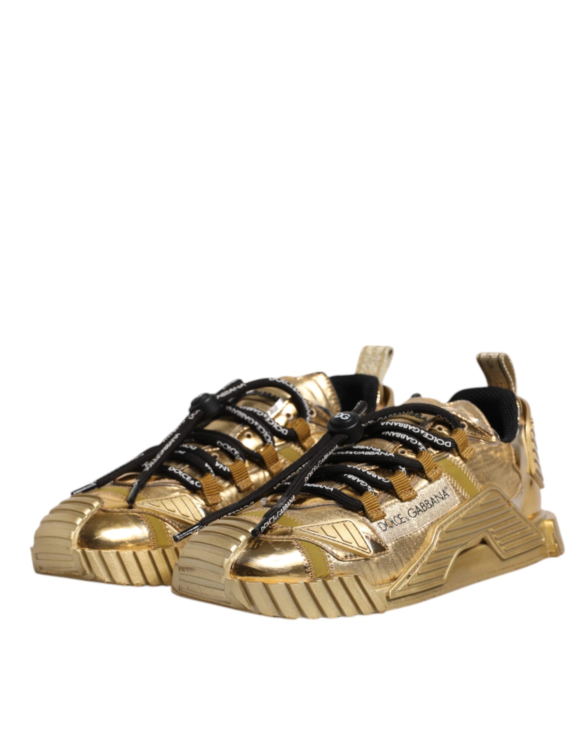 Gold baby shoes with black laces