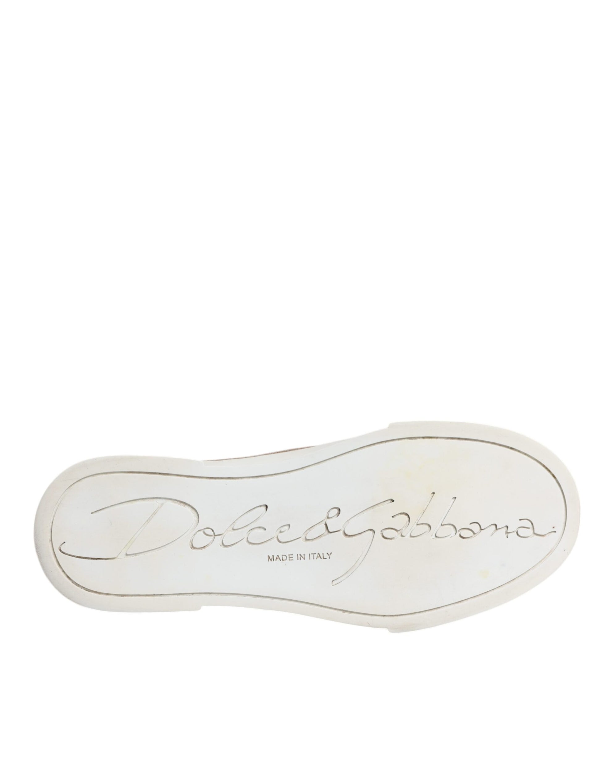 A pair of white sneakers with gold logo, featuring a low top design and the brand name "Dolce & Gabbana" on the side