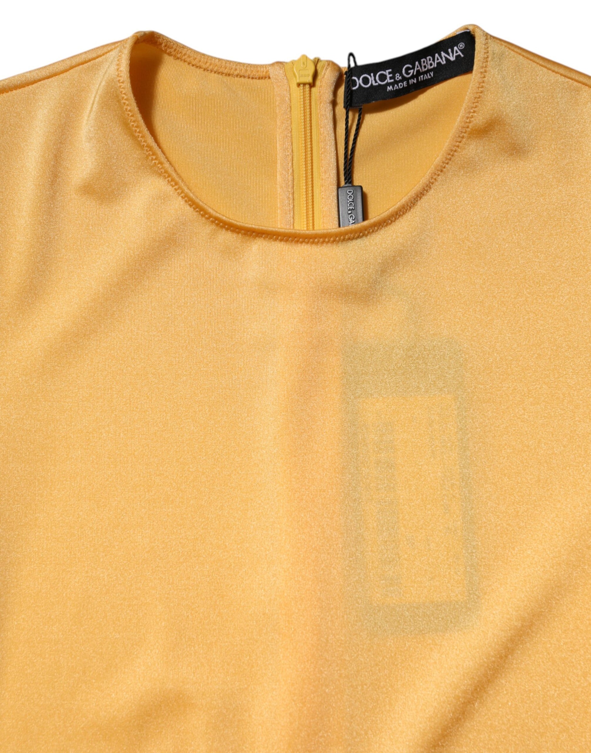A yellow stretch long sleeve bodysuit dress by Dolce & Gabbana