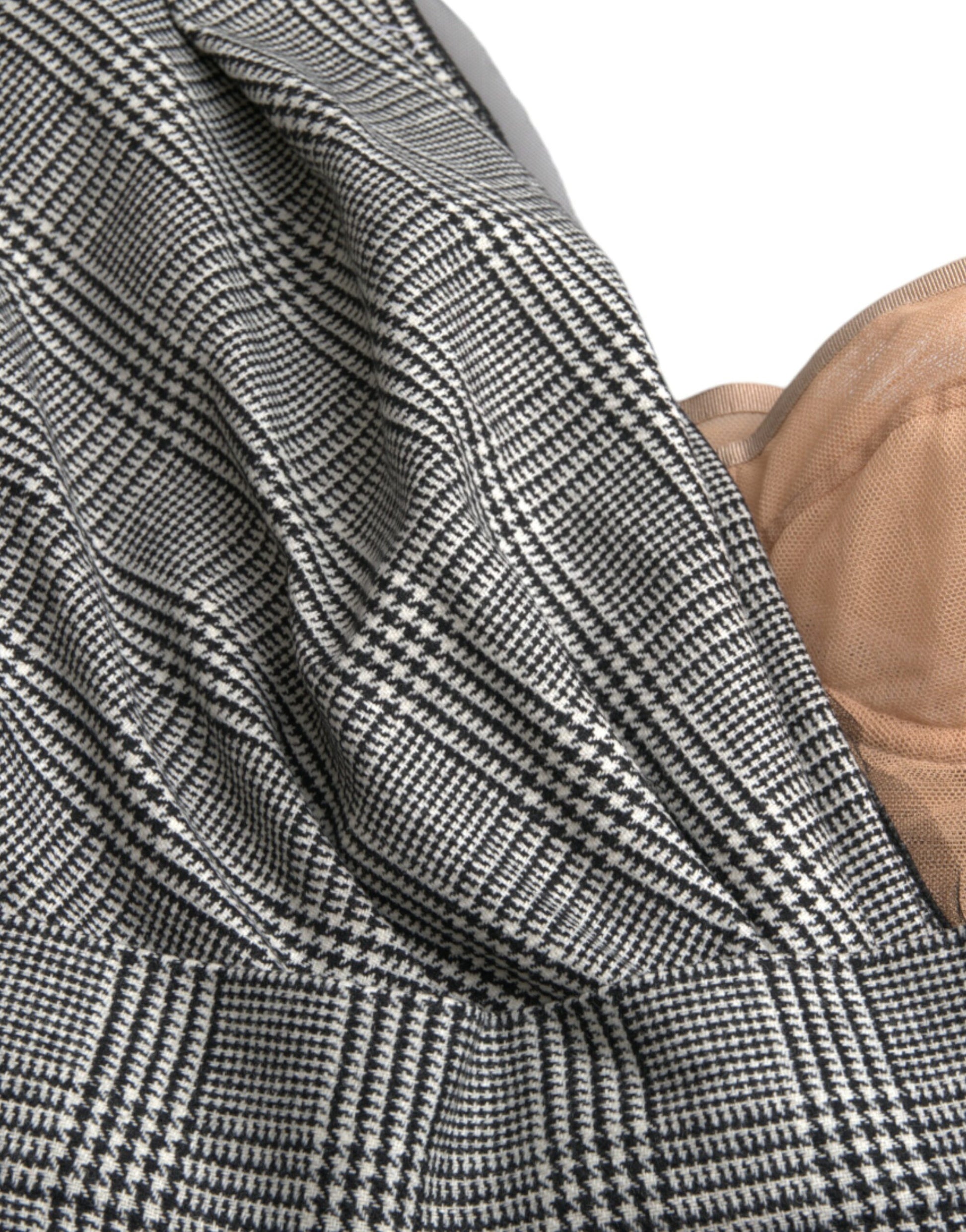 A gray beige layered one shoulder maxi dress with a visible texture and design