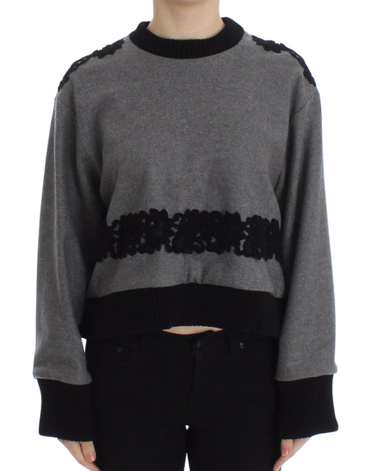 Long sleeve sweater with fringe detailing on neckline
