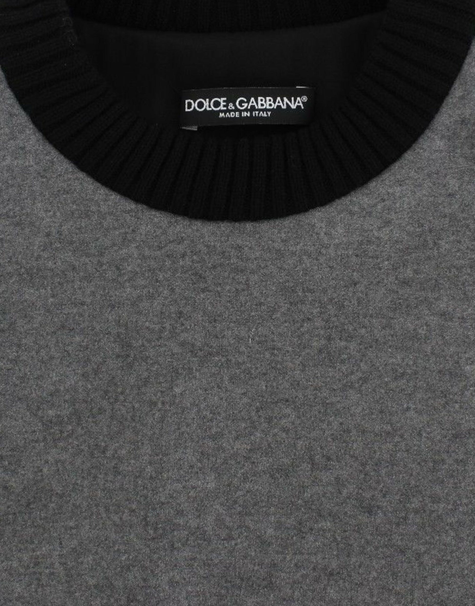 Black knit cap with ribbed cuffs and hem