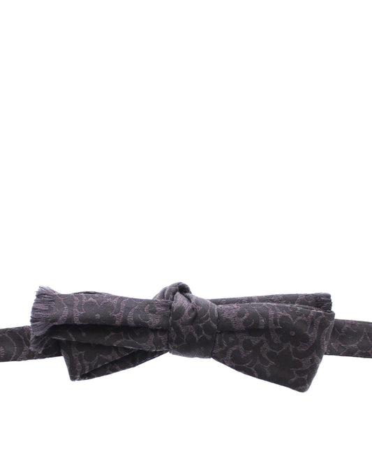 Black bow tie on white background