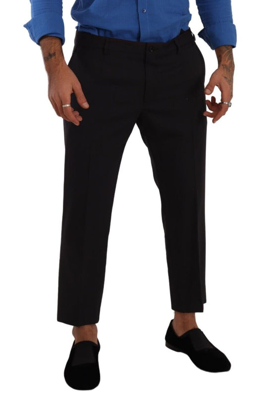 Man wearing black pants and blue shirt
