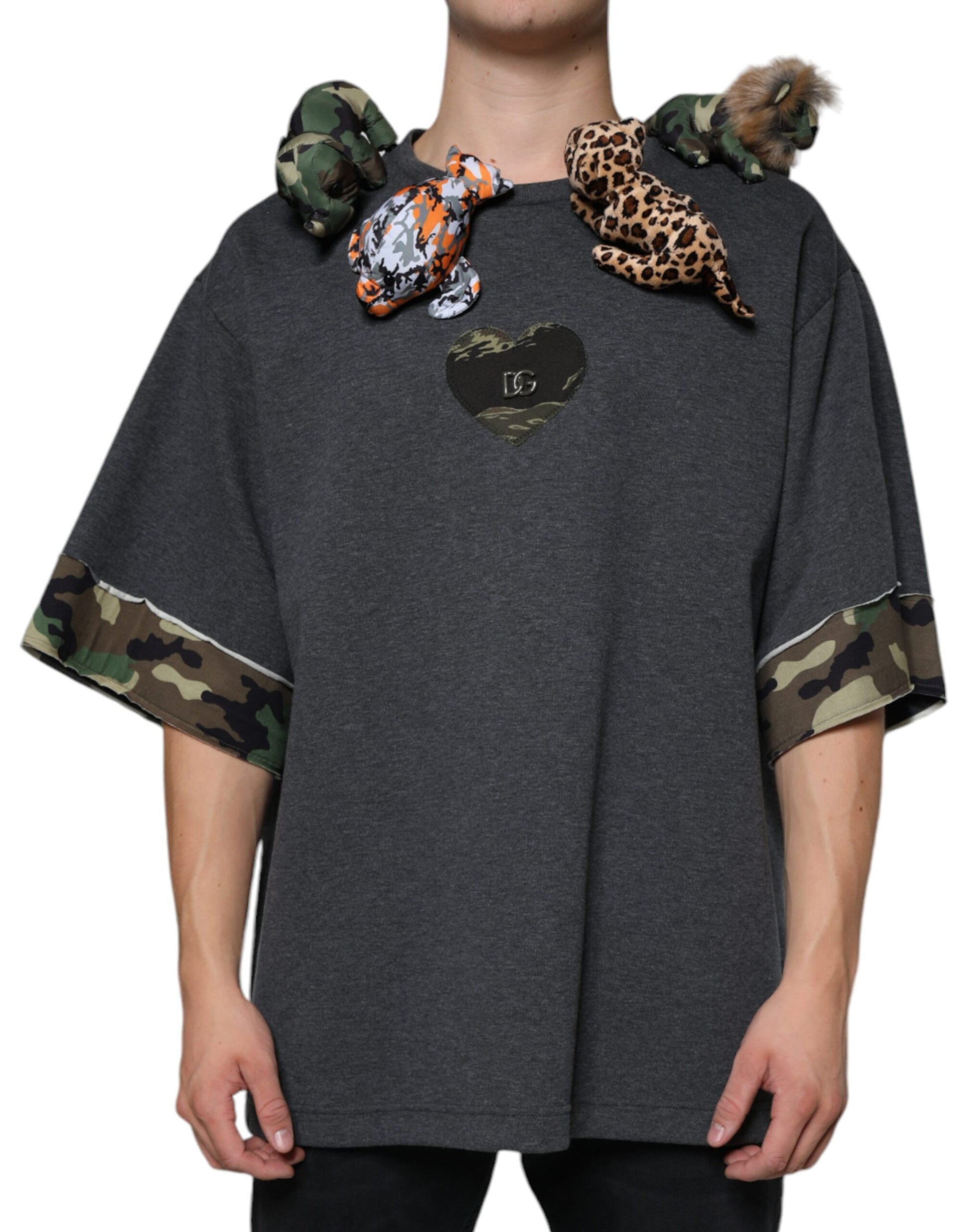 Mannequin wearing gray hoodie with camouflage sleeves and a heart design on front