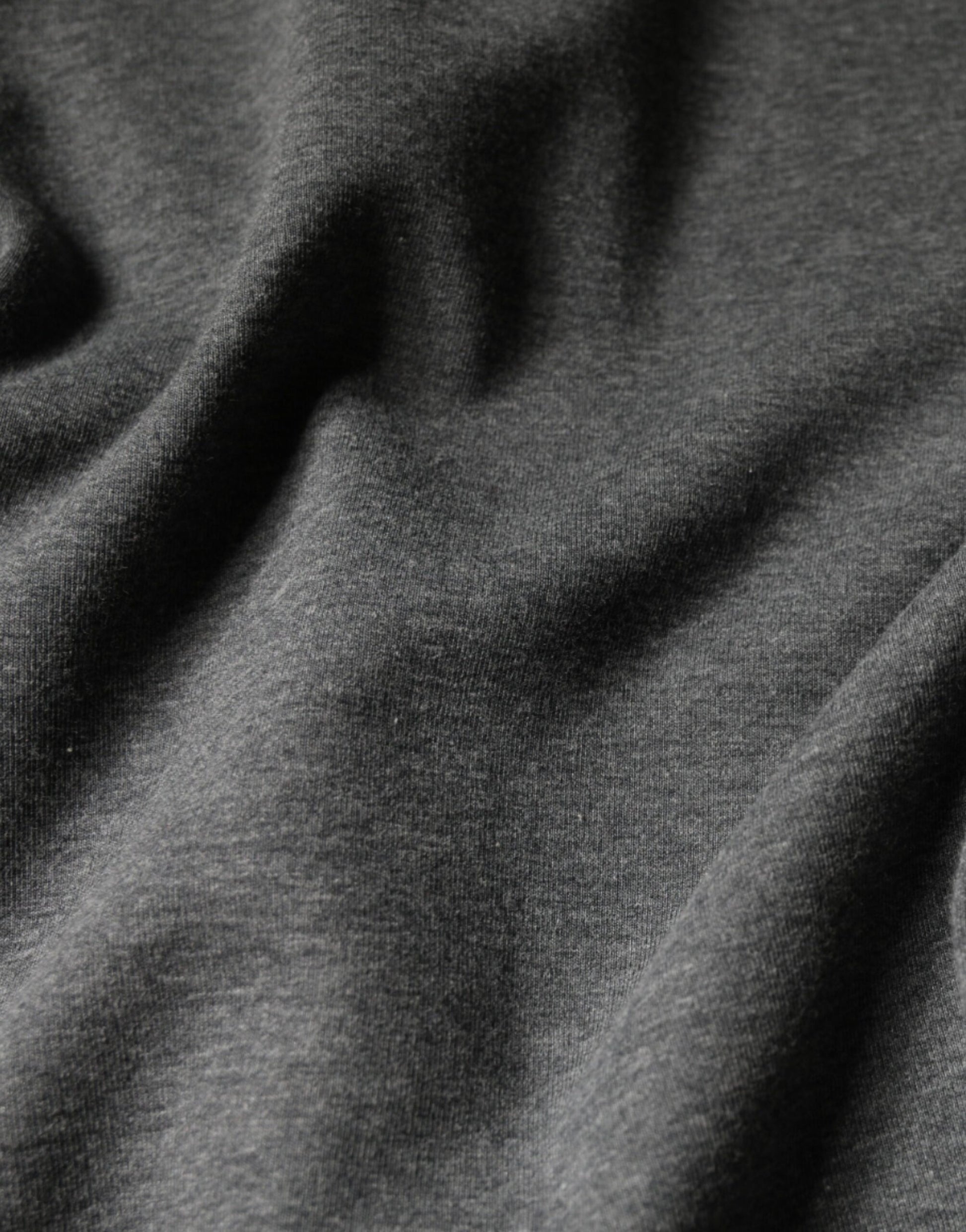 The fabric is dark grey