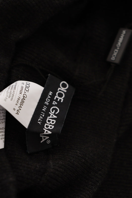 Tag on black sweater