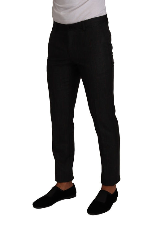 Man wearing black pants and white shirt