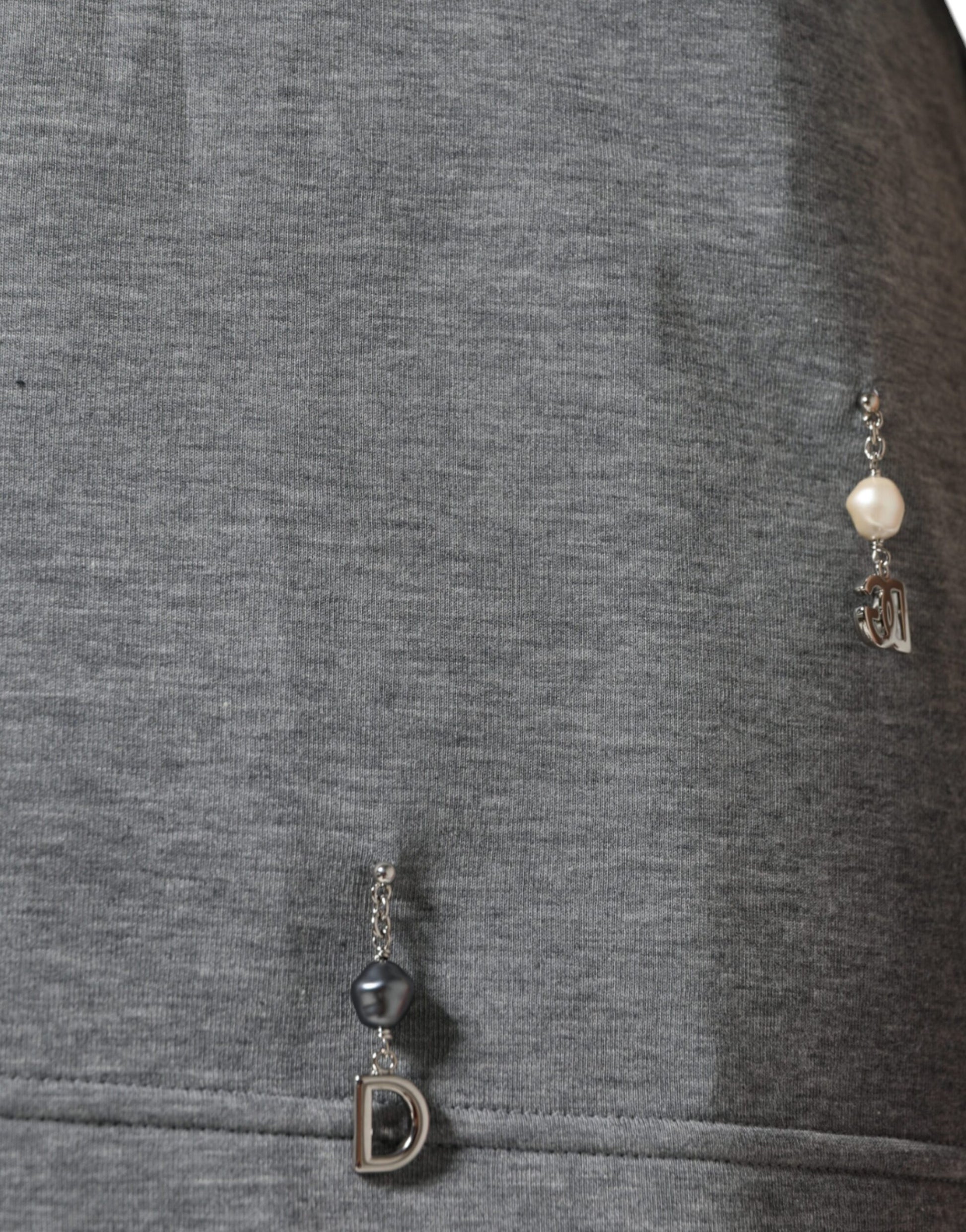 Earring with a letter D charm