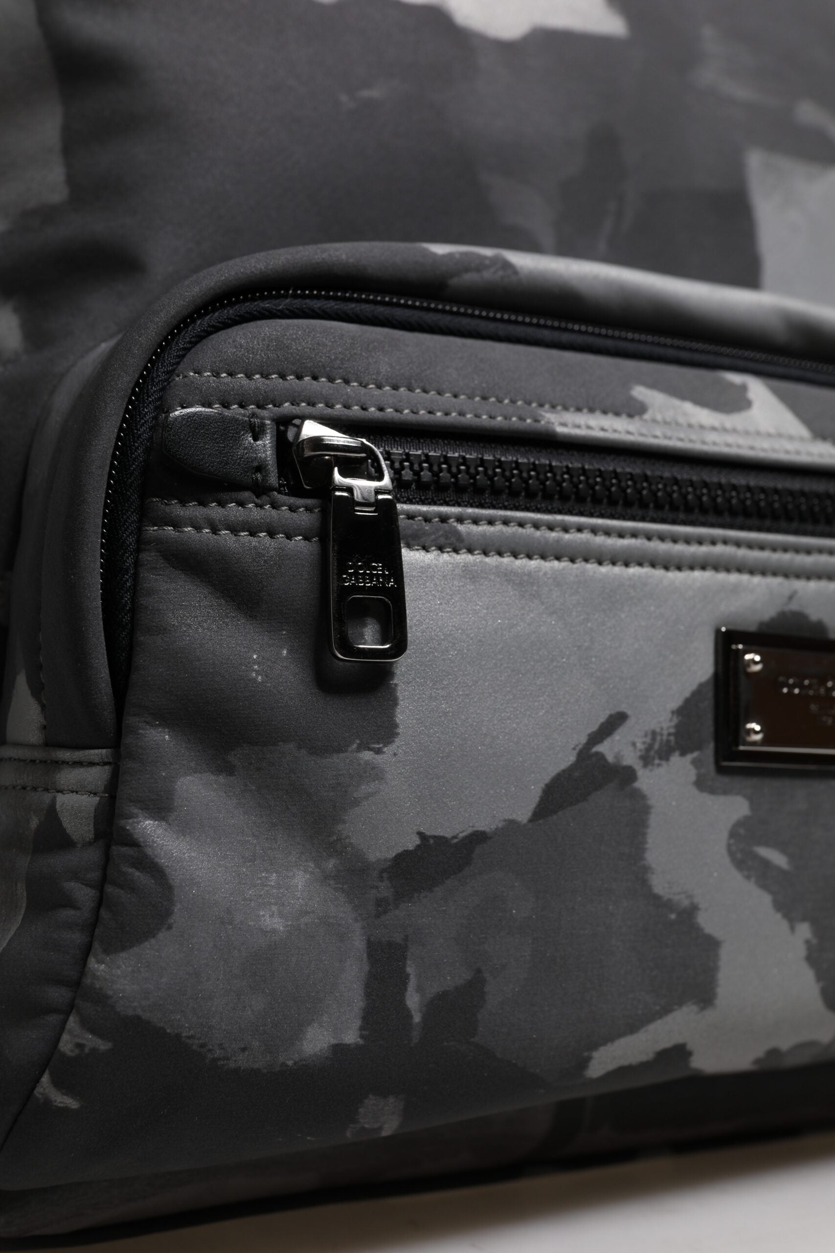 Grey camouflage laptop case with zipper closure