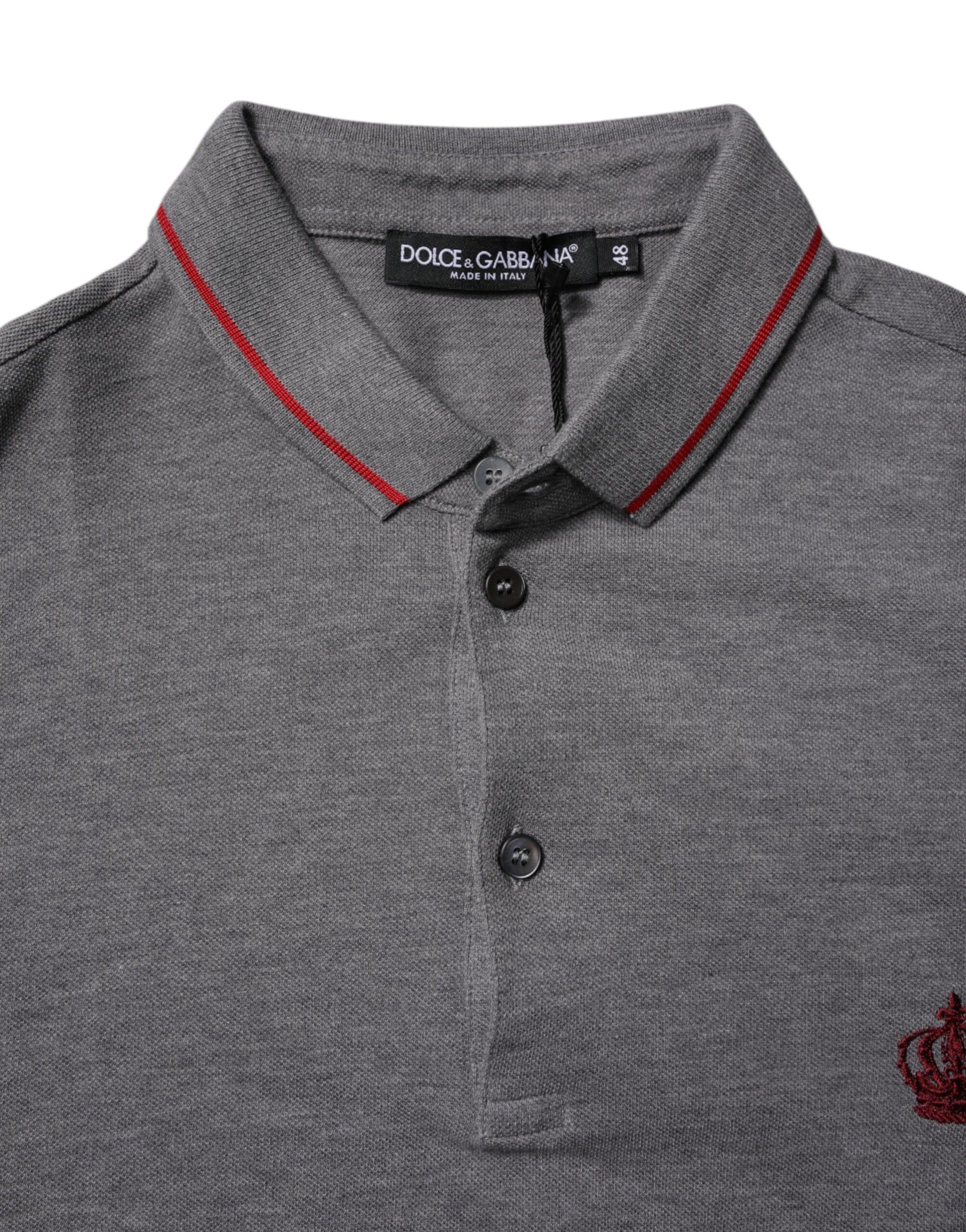 A gray polo shirt with a collar and red trim, made of cotton