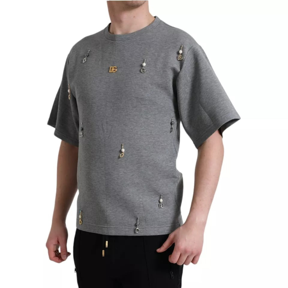 Grey short sleeved t-shirt with gold buttons