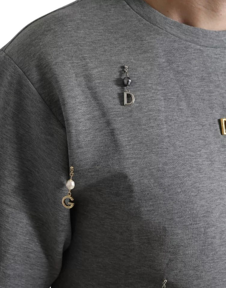 Grey sweatshirt with embroidered letters and pearl buttons