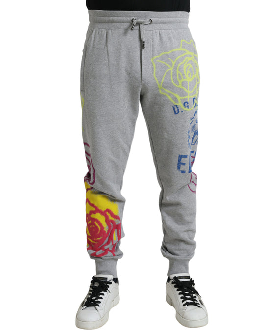 Grey sweatpants with colorful rose designs on legs