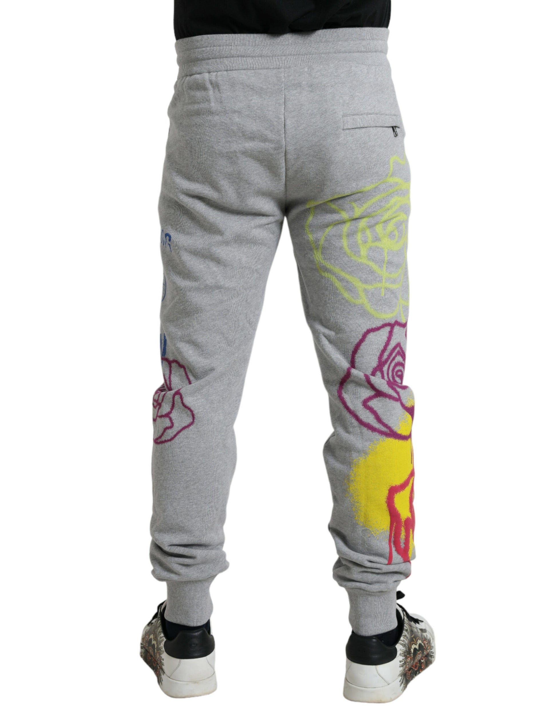 Grey sweatpants with colorful graffiti designs on legs