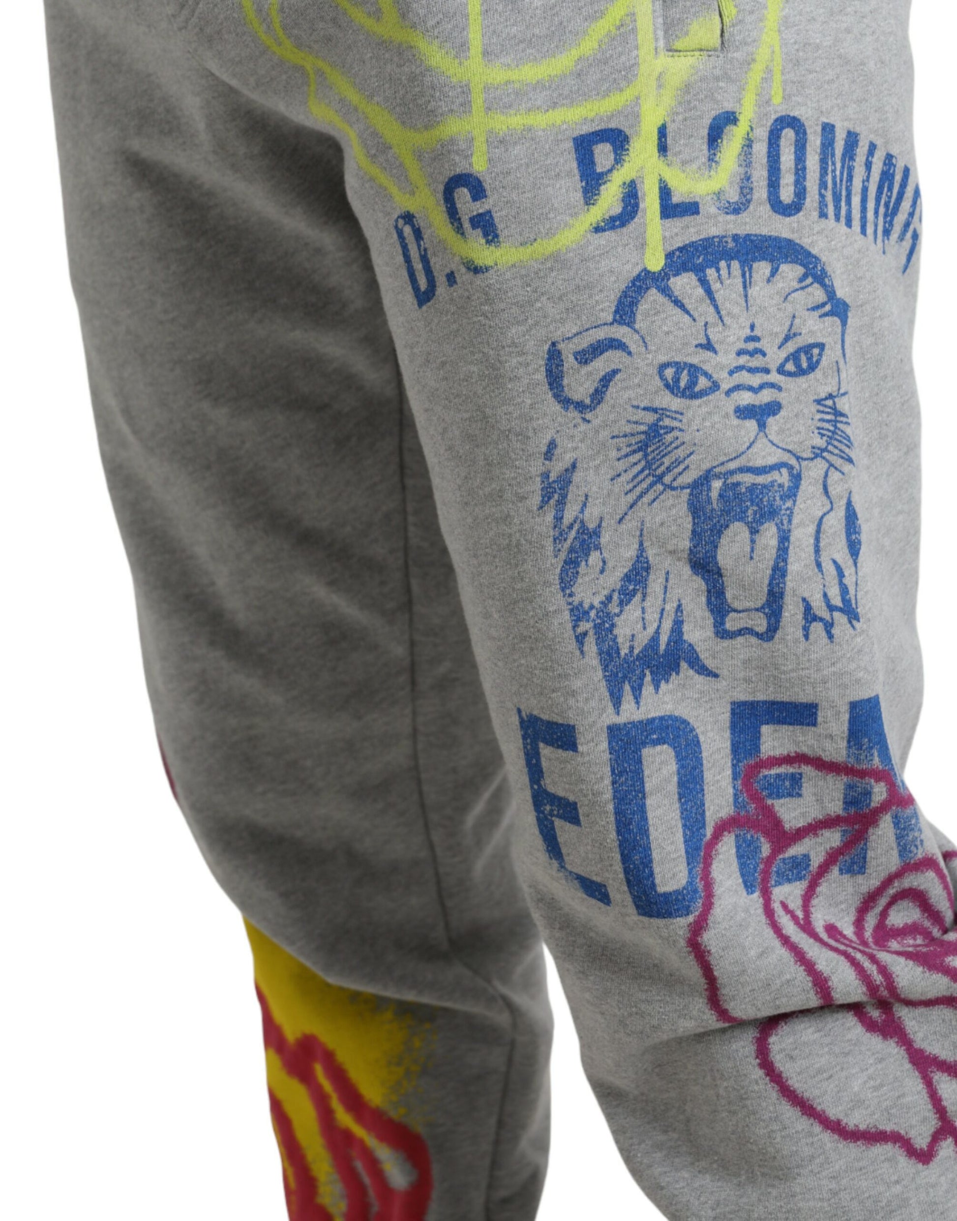 Pair of gray sweatpants with blue and yellow designs on leg