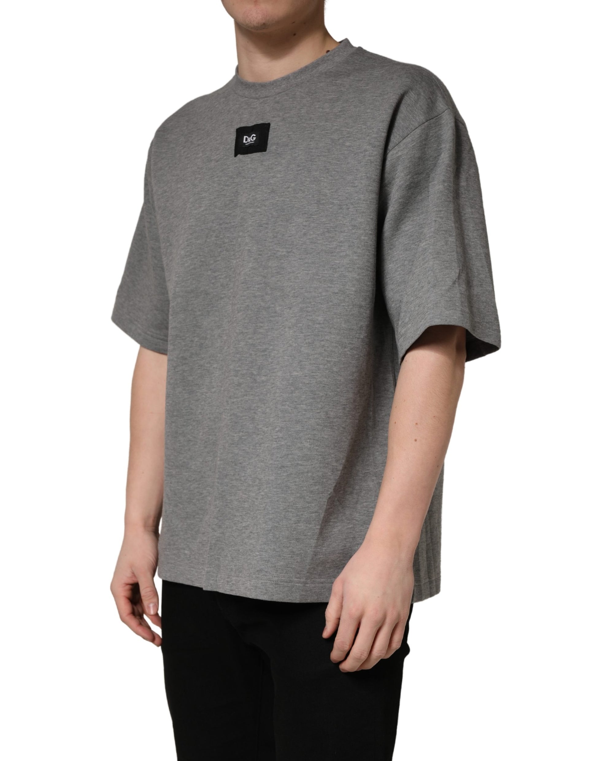 A gray cotton crew neck t-shirt with a logo applique on the chest