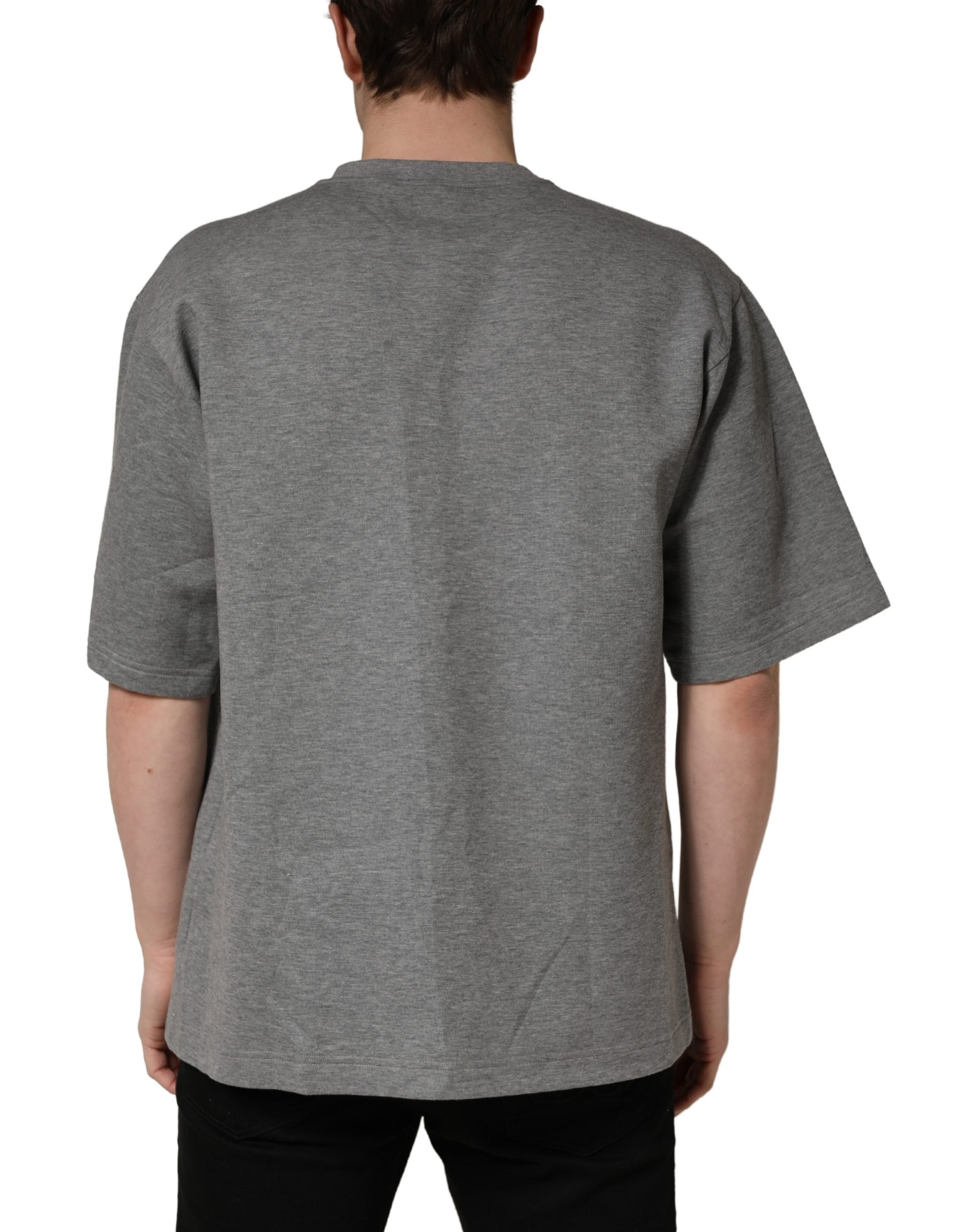 The back of a gray cotton crew neck t-shirt with logo applique