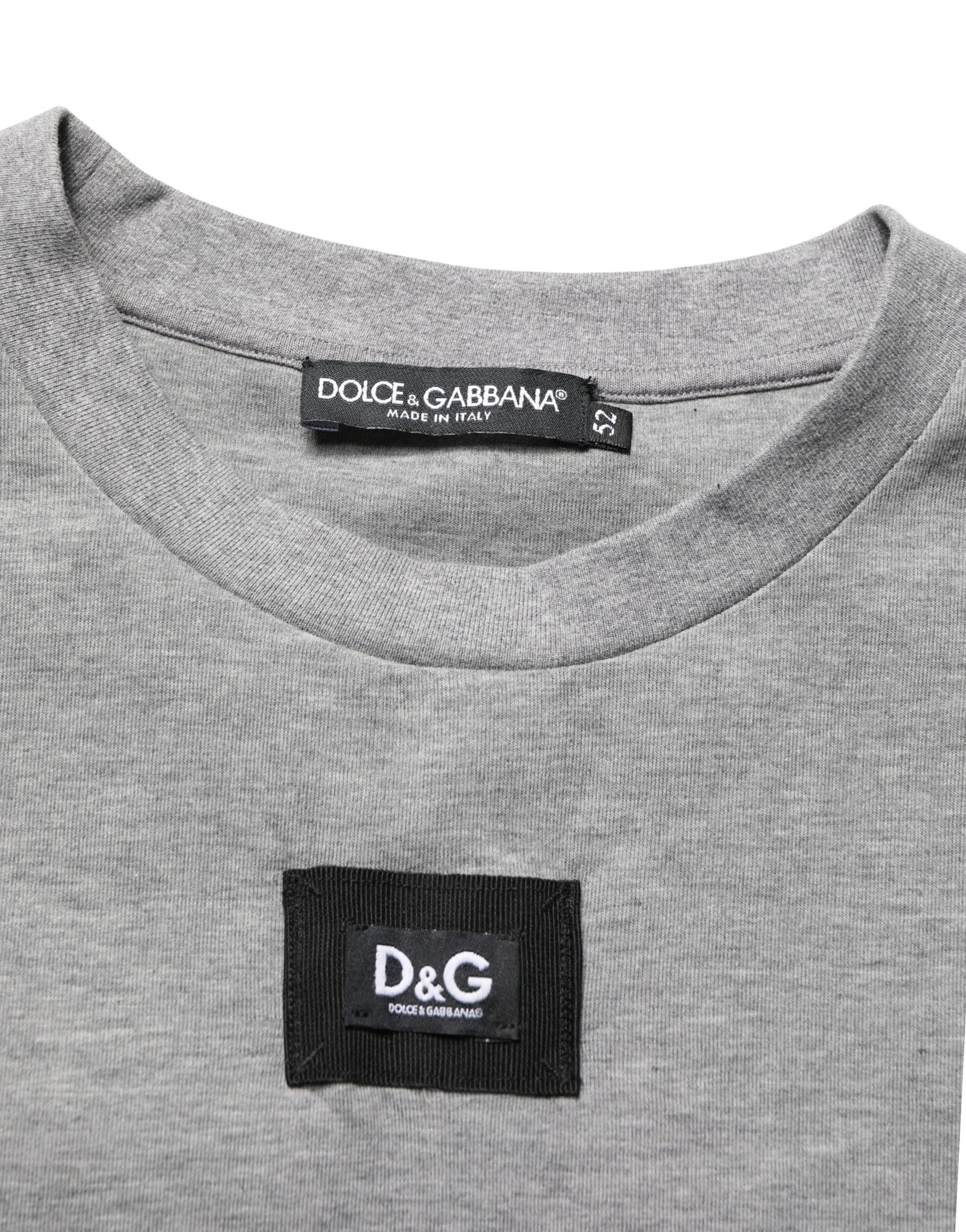 A gray cotton crew neck t-shirt with a logo applique on the left chest