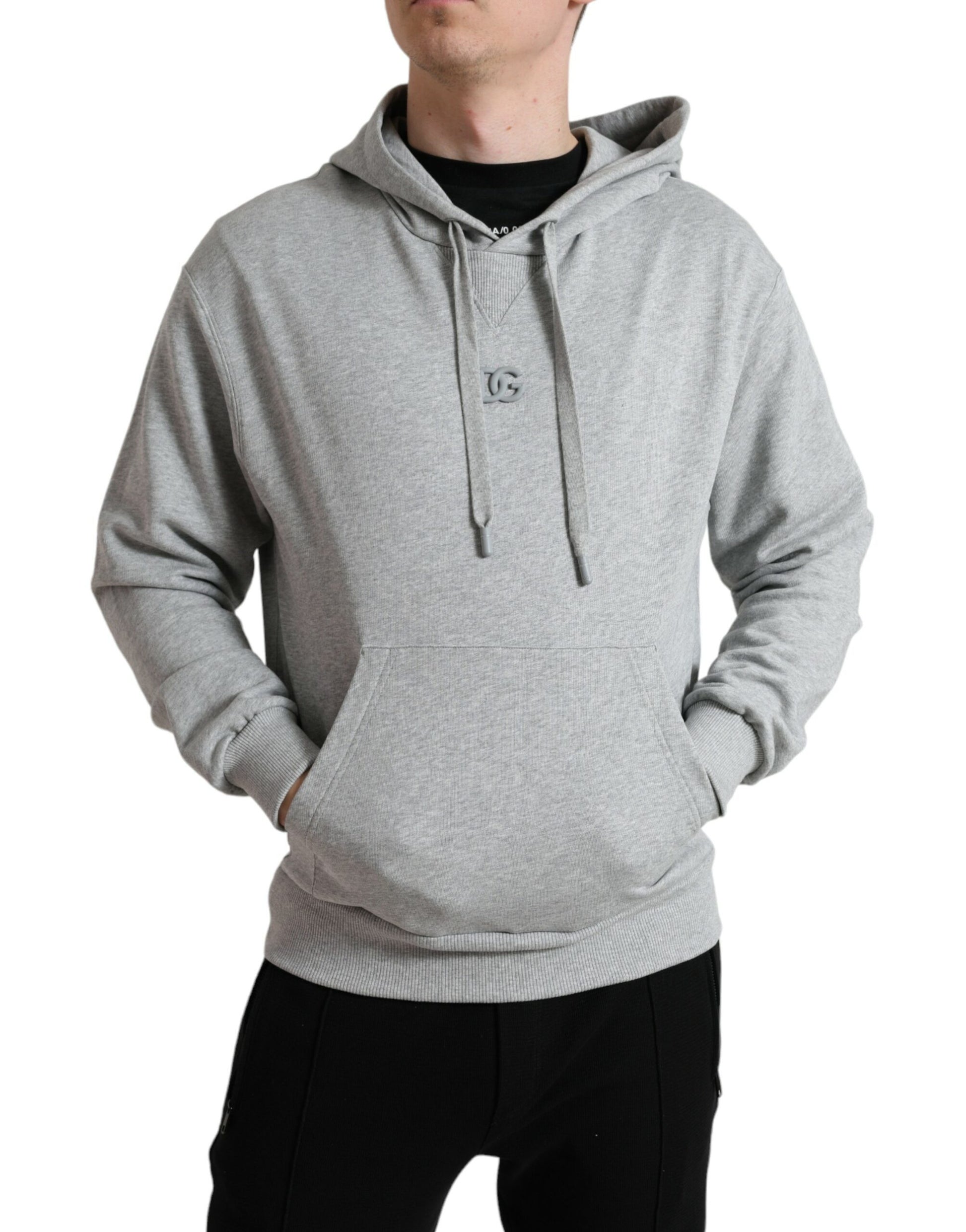 Man wearing a gray hoodie with stripes