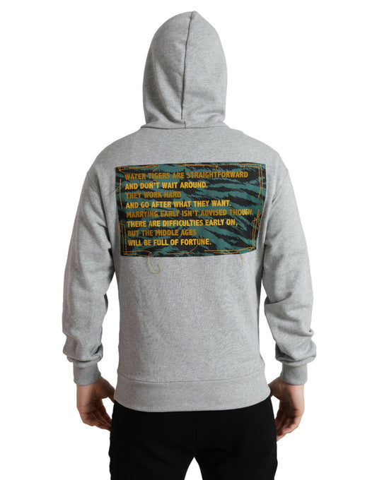 Grey hoodie with printed back design featuring a quote in yellow font on a camouflage background