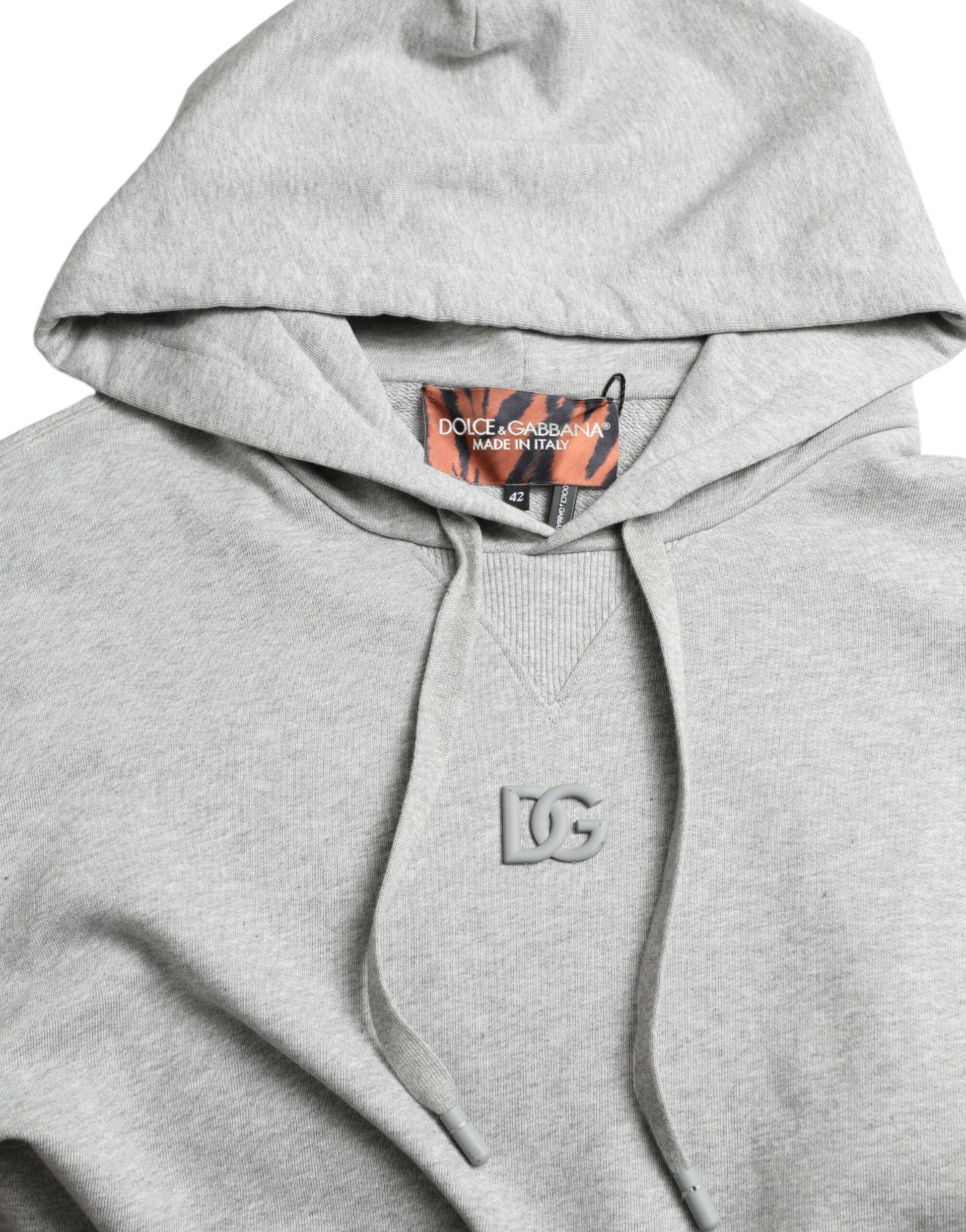 Grey hoodie with white logo on front