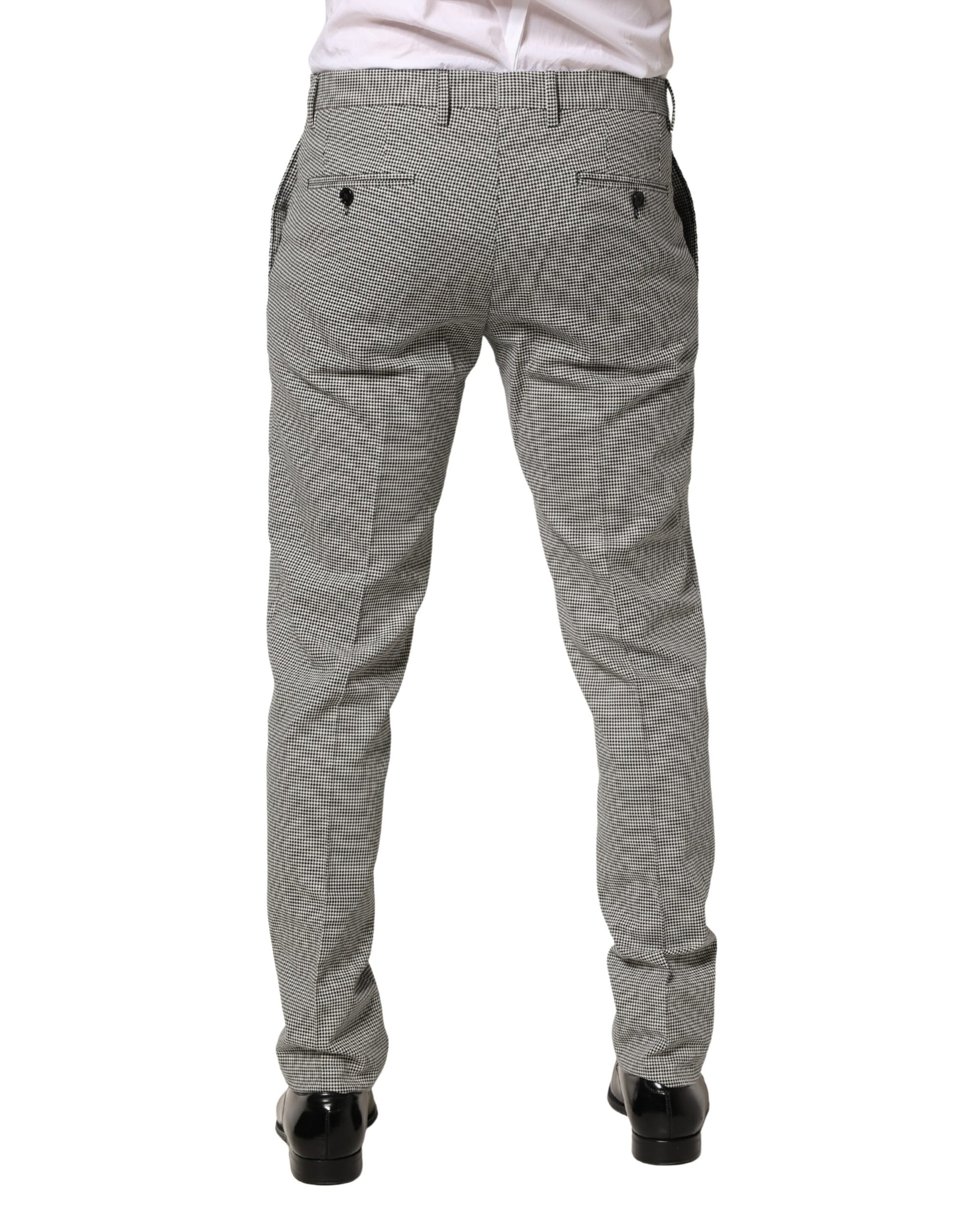 A pair of gray cotton skinny dress formal trousers