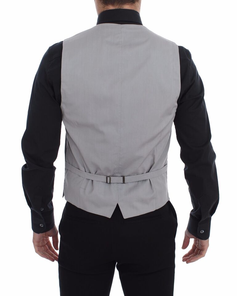 A gray cotton vest with a slim fit and button front detail