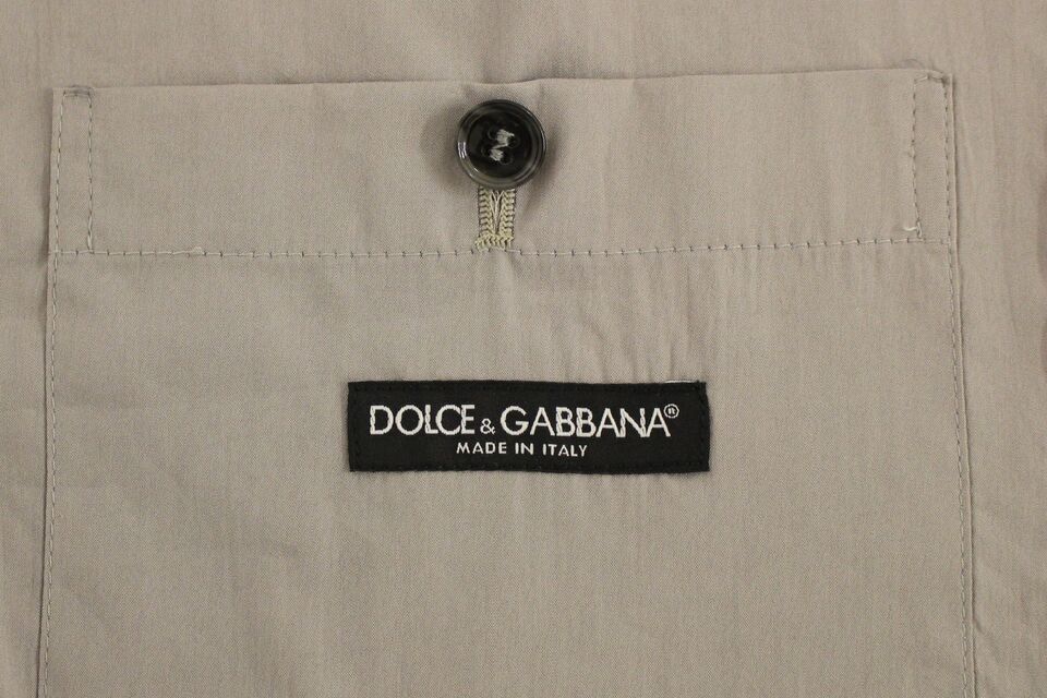 A gray cotton vest with a button front from Dolce & Gabbana