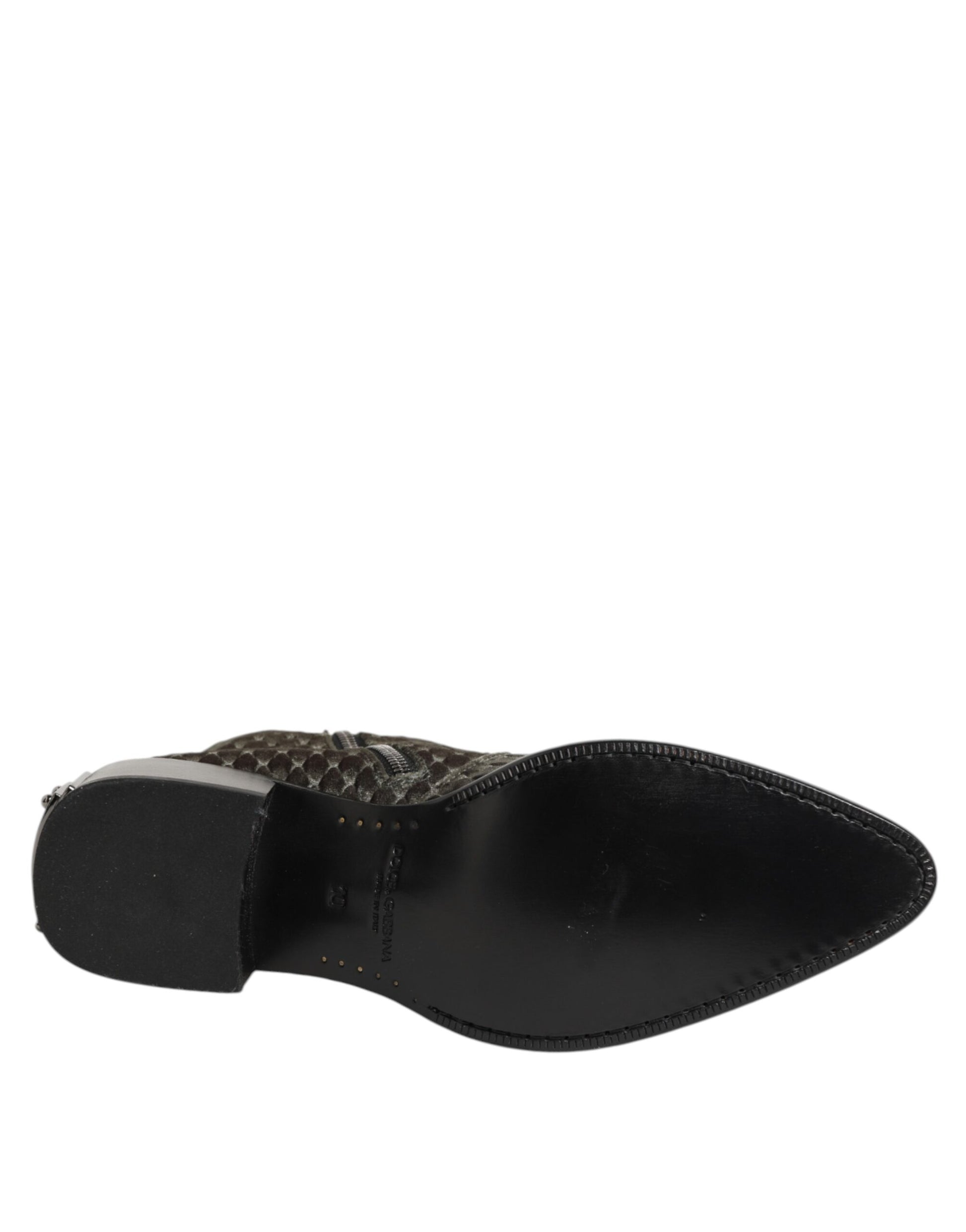 Black leather shoe on display