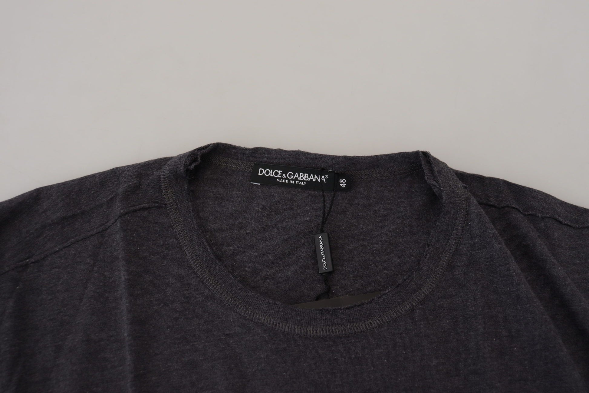 Black t-shirt on hanger