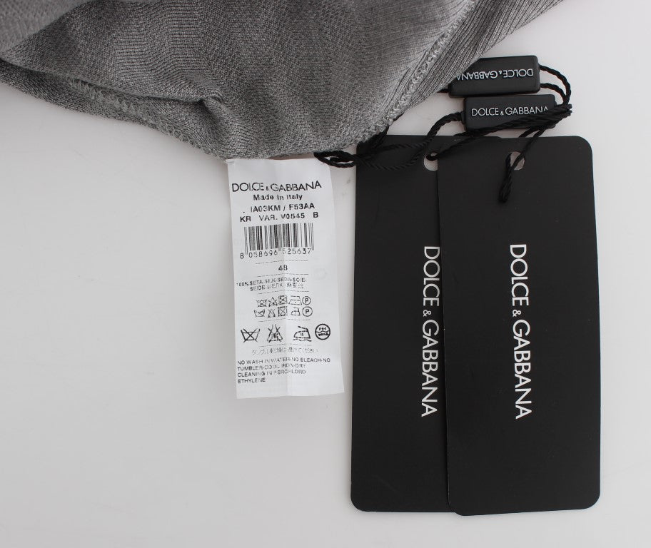 Black tag on clothing with white lettering
