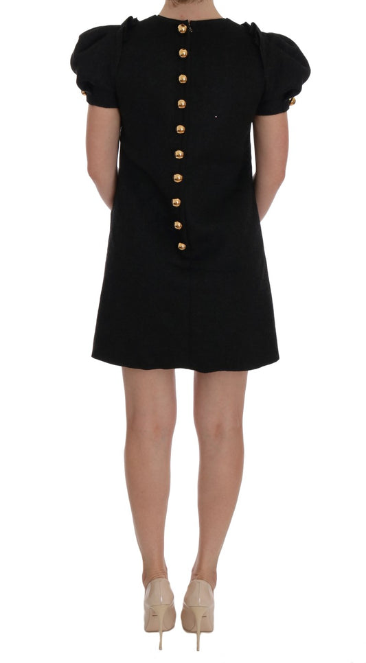 Black dress with gold buttons