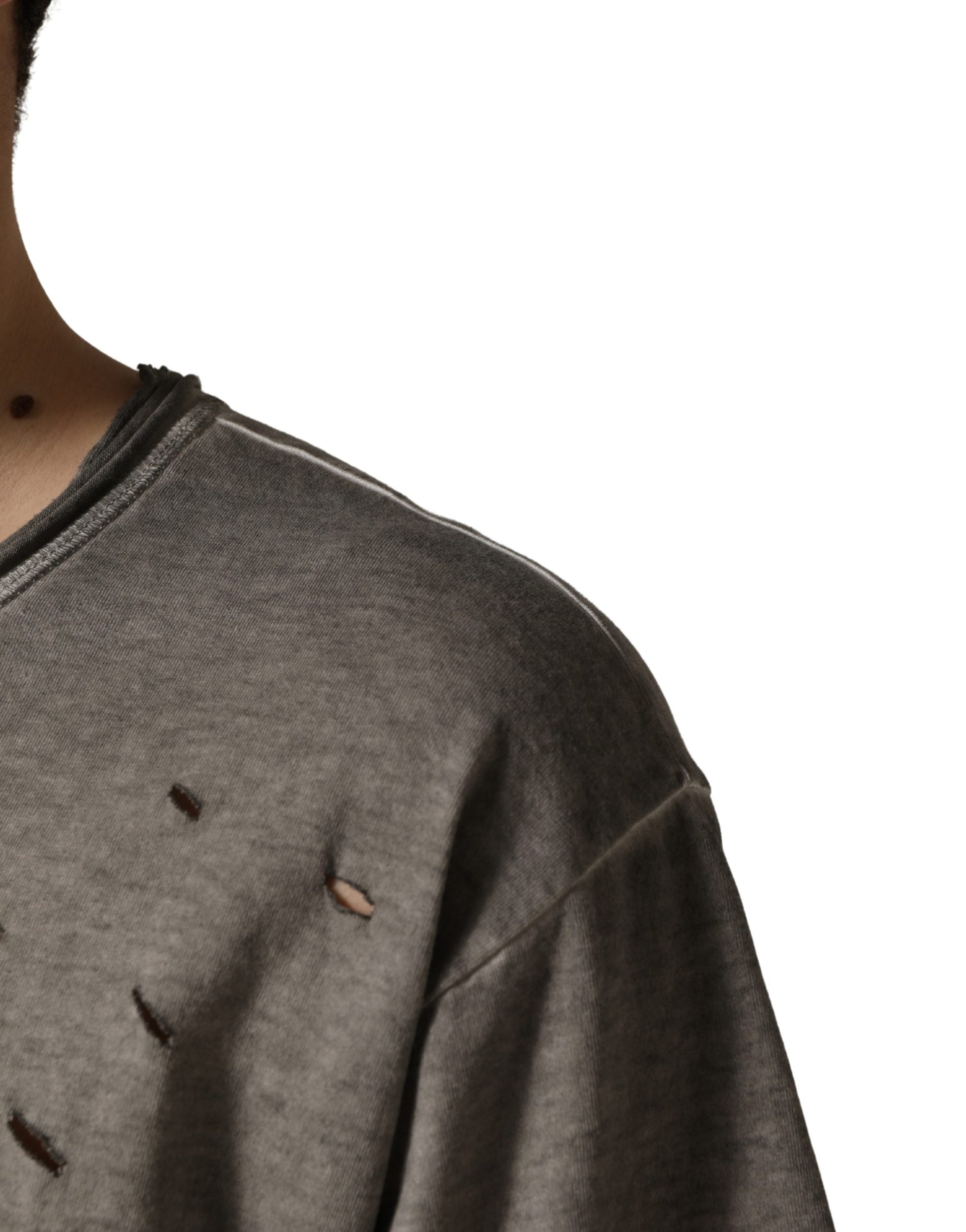 Grey sweatshirt with holes in sleeve