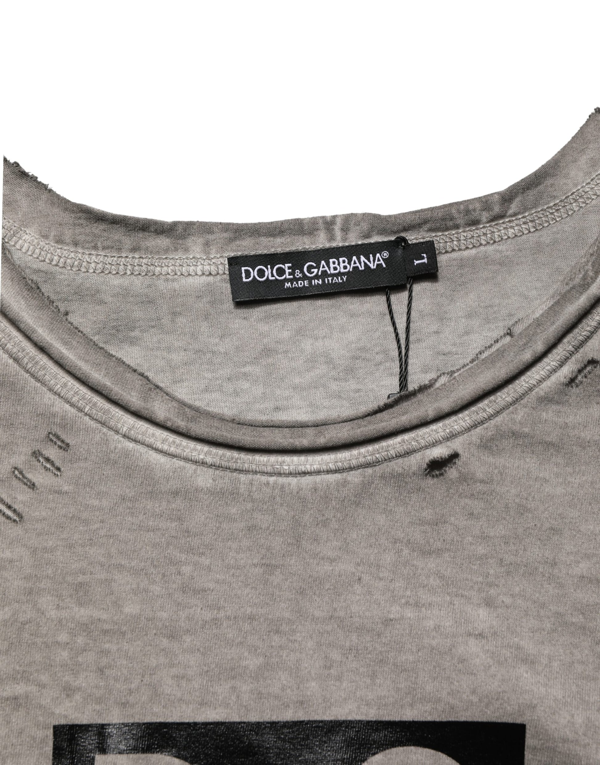 The shirt is gray with a black label on the neck