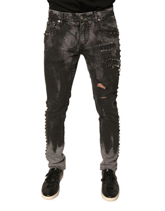 Pair of distressed jeans with rips and patches