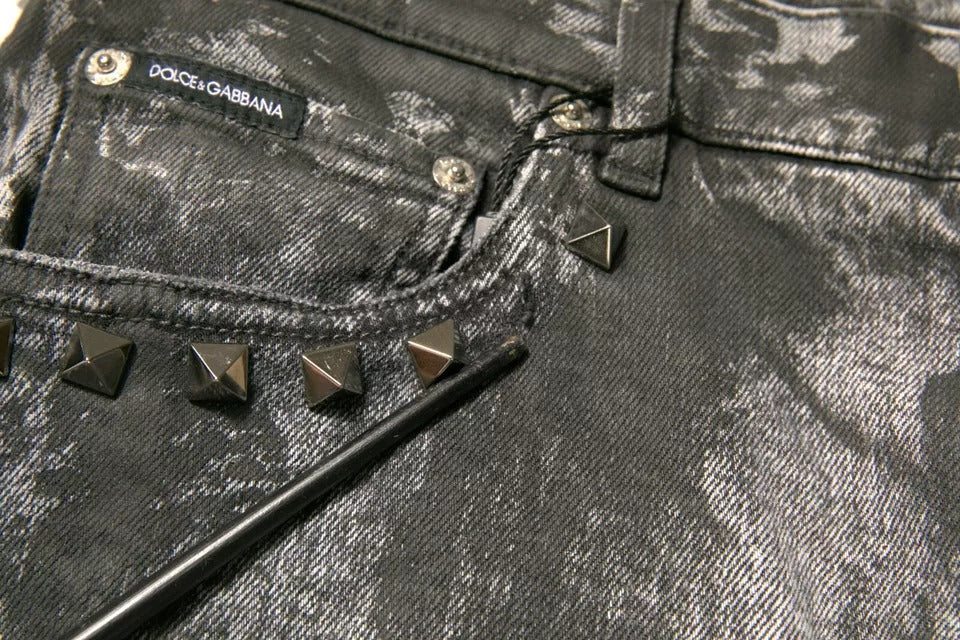 Black denim jeans with spikes on front pocket