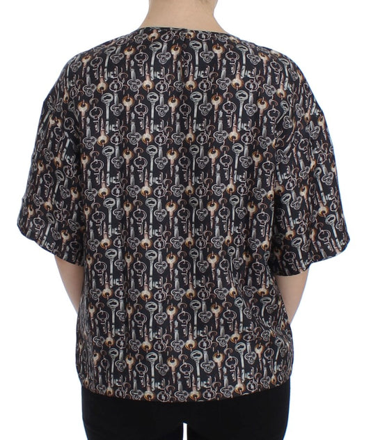 Black shirt with patterned back featuring multiple images of a person