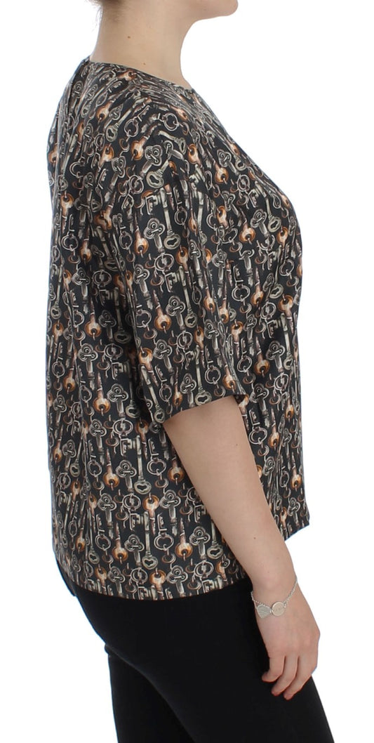 Woman wearing a black and white patterned top