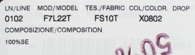 White label on fabric with black text