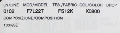 White label on fabric with black lettering