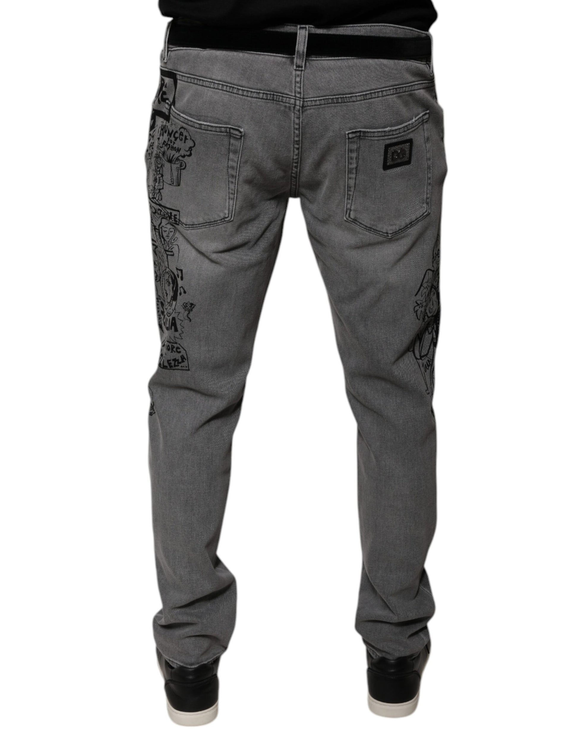 Pair of grey jeans with graphic design on legs
