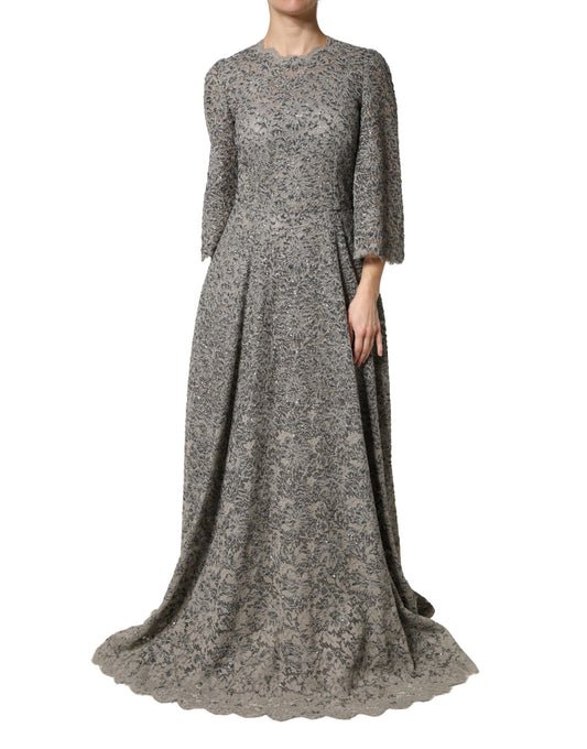A long sleeve, gray lace maxi dress with a floral pattern