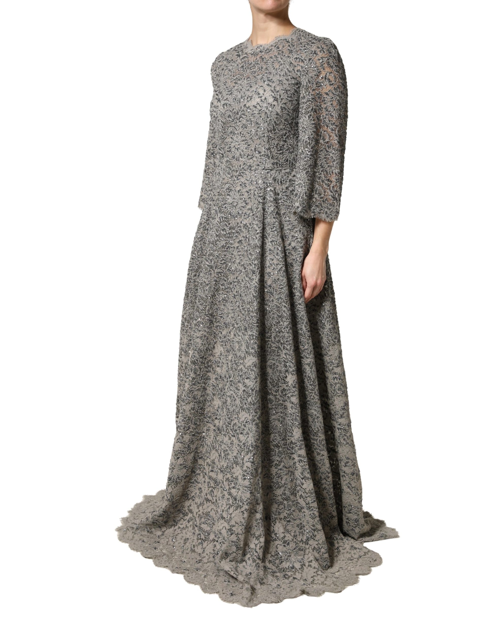 A long sleeve, gray lace maxi dress with a floral pattern