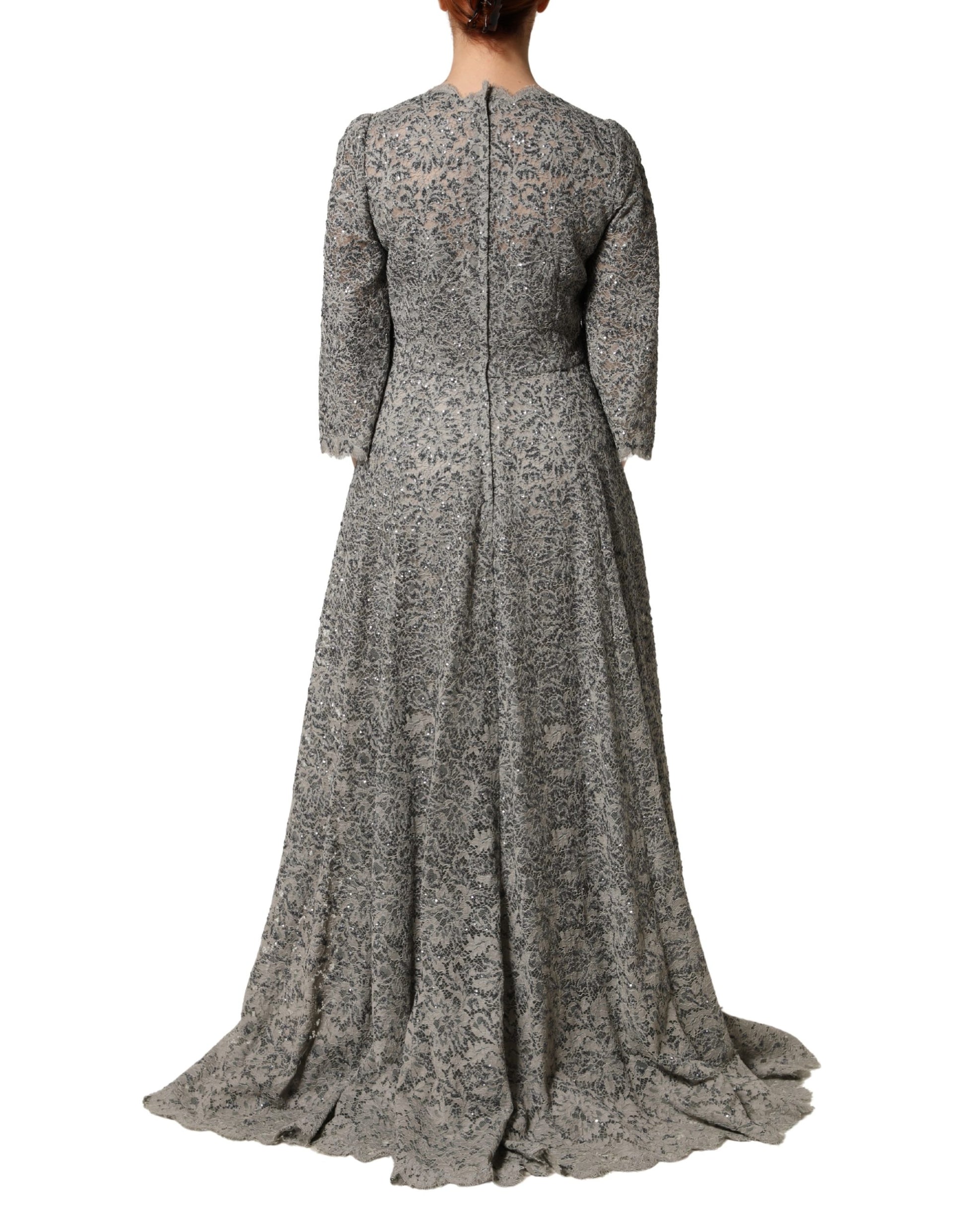 A long sleeve, gray lace maxi dress with a floral pattern