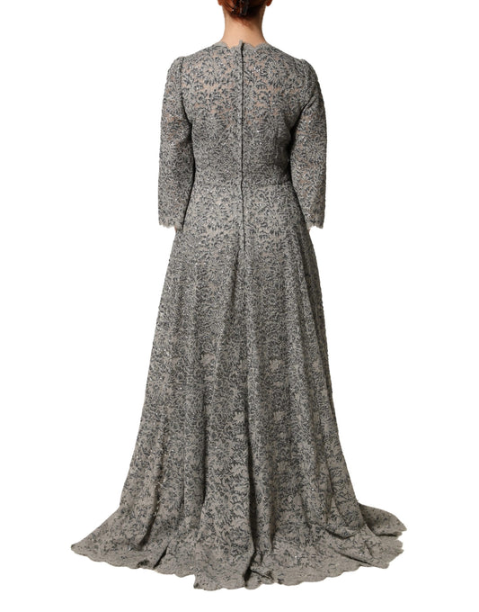 A long sleeve, gray lace maxi dress with a floral pattern