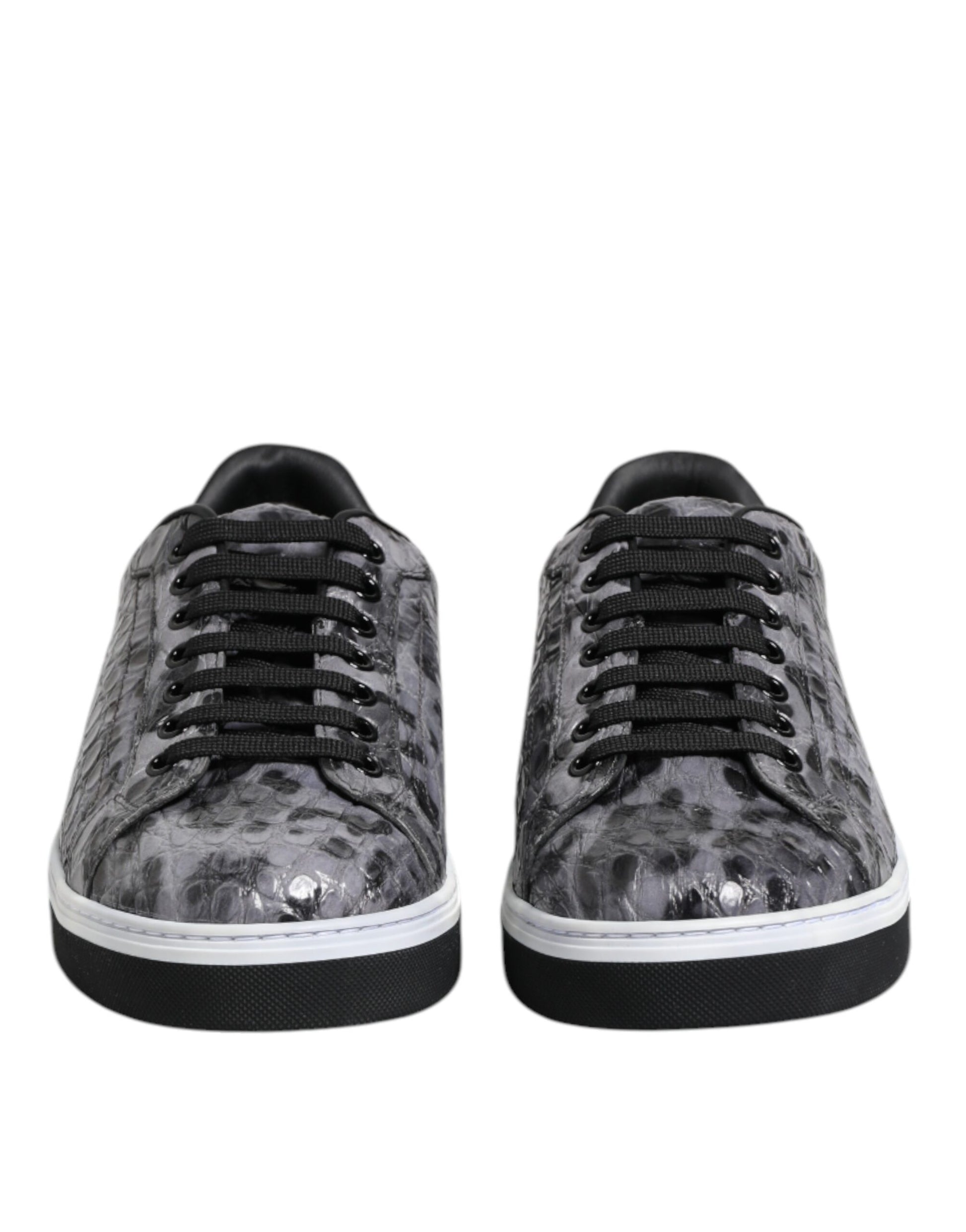 Pair of gray leather sneakers with a leopard print pattern on the side