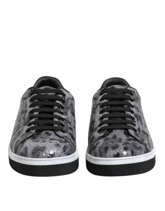Pair of gray leather sneakers with a leopard print pattern on the side